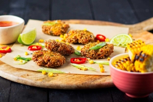 Sweetcorn fritters on a wooden board