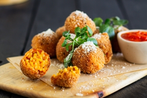 Tomato Arancini on serving board